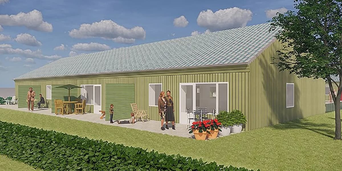 En rendering av ett litet grönt hus med en uteplats